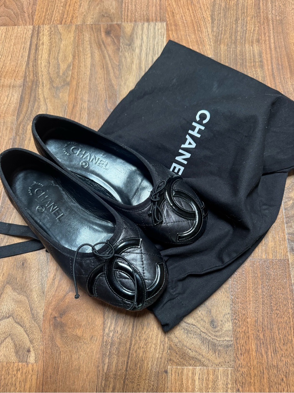 CHANEL Black Quilted Leather CC Ballet Flats with Bow